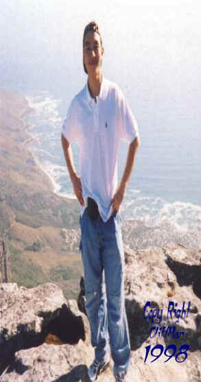 standing_the_cliff.JPG (28542 bytes)